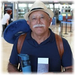 Photo of a man waiting at an airport terminal