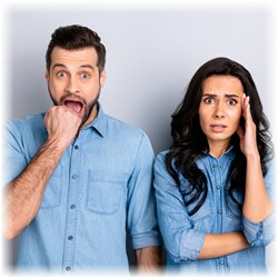 Photo of a couple with shocked expressions