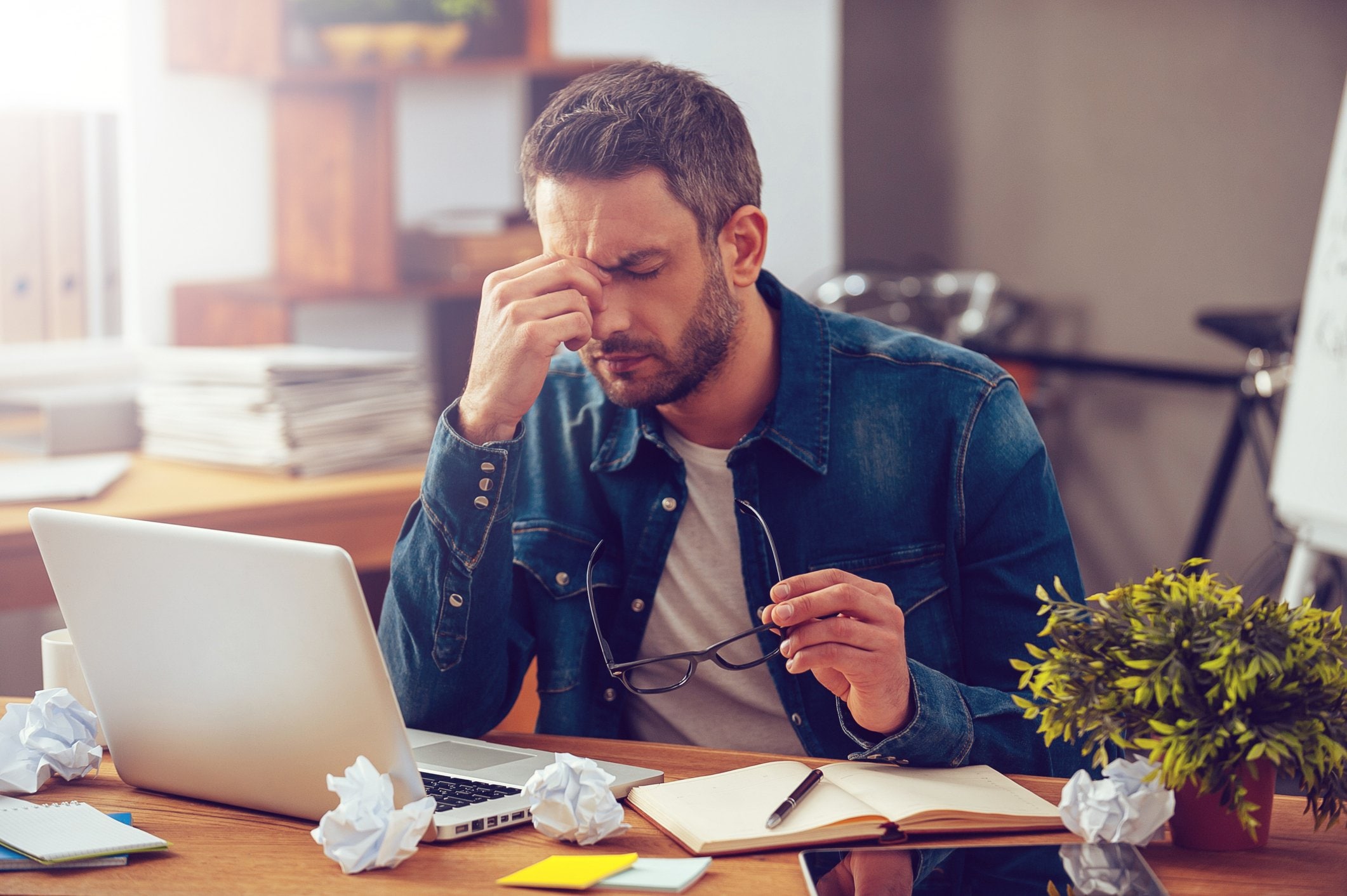 Photo of man with migraine pain