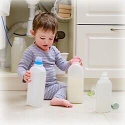 Photo of child playing with toxic chemicals