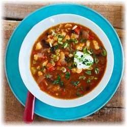 Photo of a bowl of black bean and hominy chili