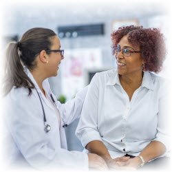 Photo of woman with female doctor