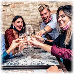 Photo of young people toasting with champagne