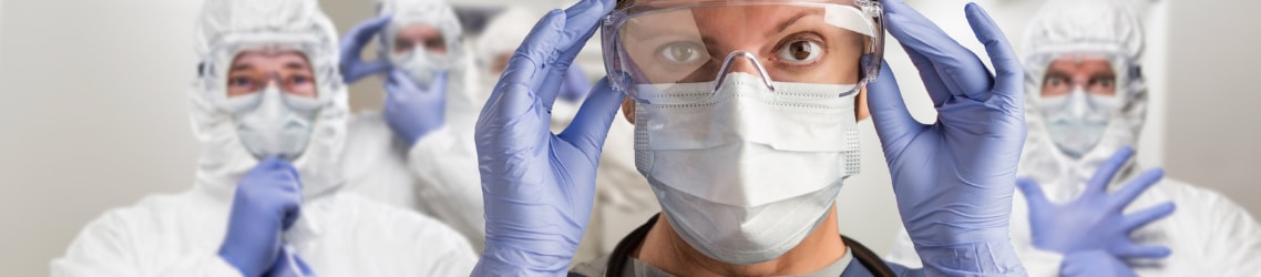 Photo of Infection control team in full PPE